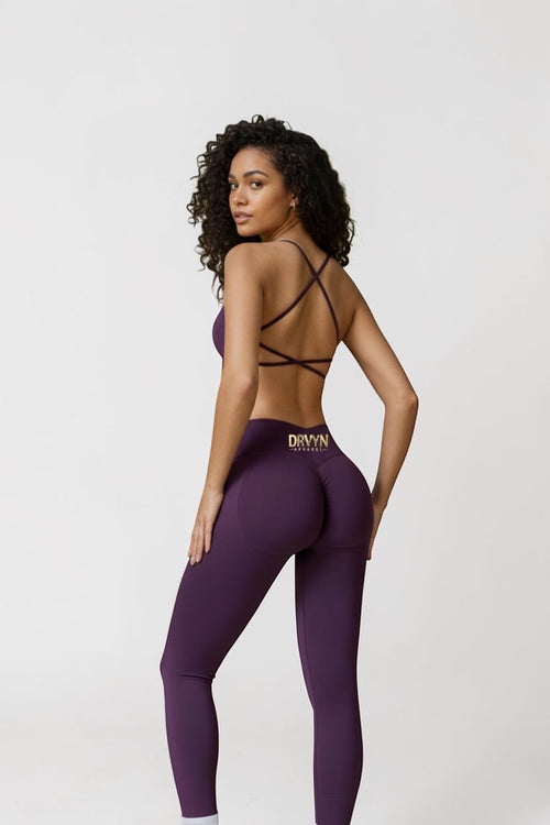 Drvyn Apparel plum high-waisted performance leggings with a sculpted fit and second-skin feel. Made from 90% nylon, 10% spandex.